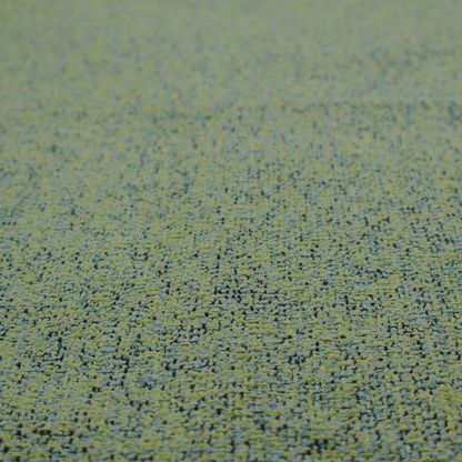 A textured moss green and teal woven upholstery fabric swatch.