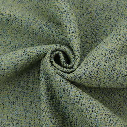 A textured moss green and teal woven upholstery fabric swatch.