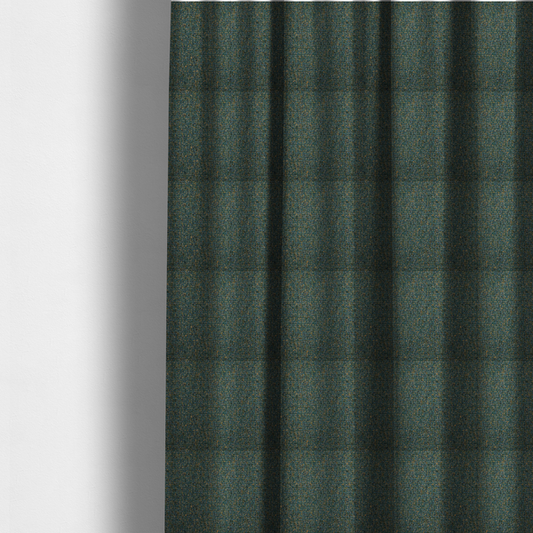 The fabric used to create these made-to-measure curtains is a multi-tonal forest green and gold textured woven fabric swatch.