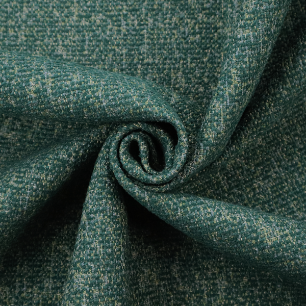 A multi-tonal emerald and dark green textured woven fabric swatch.
