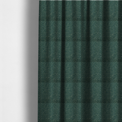 The fabric used to create these made-to-measure curtains is a multi-tonal emerald and dark green textured woven fabric swatch.