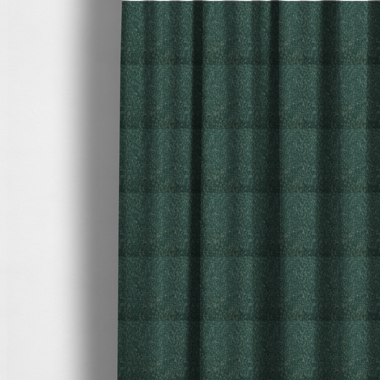 The fabric used to create these made-to-measure curtains is a multi-tonal emerald and dark green textured woven fabric swatch.