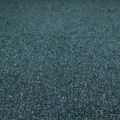 A multi-tonal deep teal and grey textured woven fabric swatch.