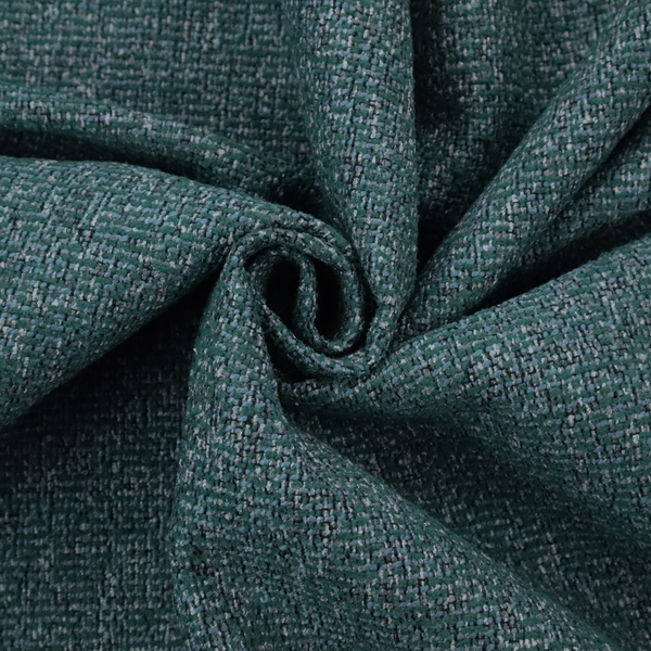 A multi-tonal deep teal and grey textured woven fabric swatch.