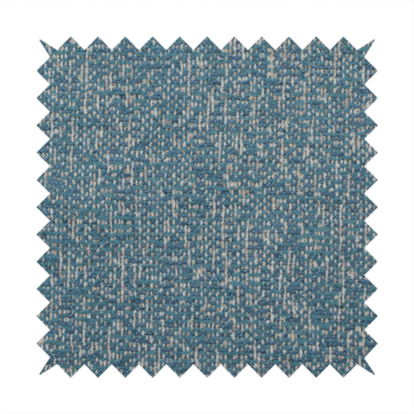 A multi-tonal blue and beige textured woven fabric swatch.