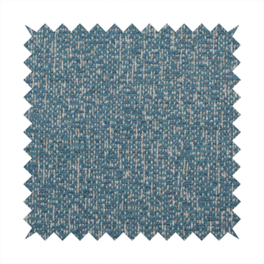 A multi-tonal blue and beige textured woven fabric swatch.