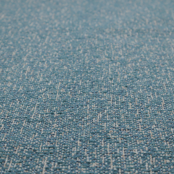 A multi-tonal blue and beige textured woven fabric swatch.