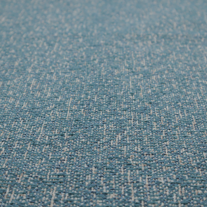 A multi-tonal blue and beige textured woven fabric swatch.