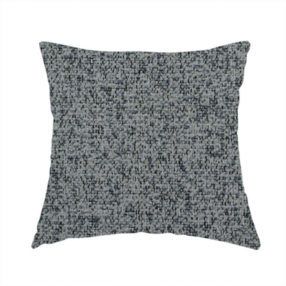 The fabric used to create this handmade cushion is a multi-tonal grey and charcoal textured woven fabric swatch.