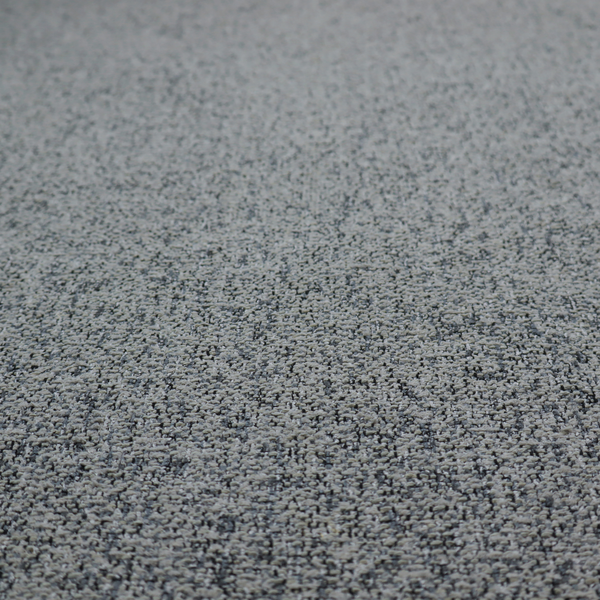 A multi-tonal grey and charcoal textured woven fabric swatch.