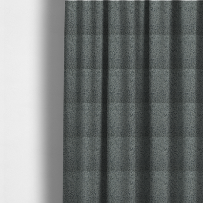 The fabric used to create these made-to-measure curtains is a multi-tonal grey and charcoal textured woven fabric swatch.