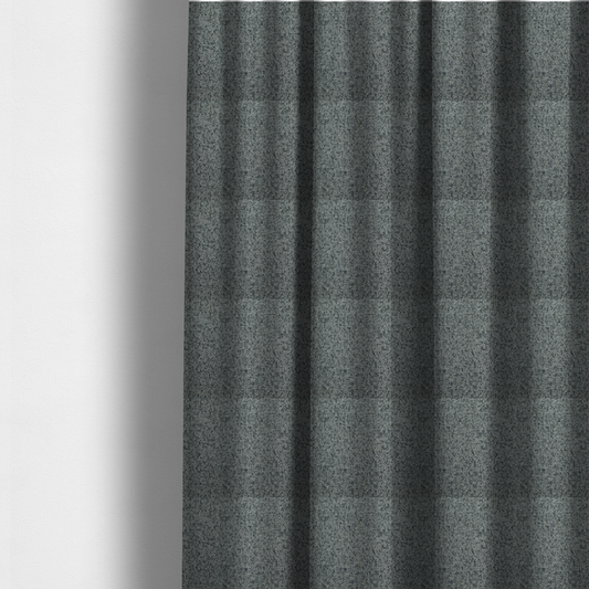 The fabric used to create these made-to-measure curtains is a multi-tonal grey and charcoal textured woven fabric swatch.