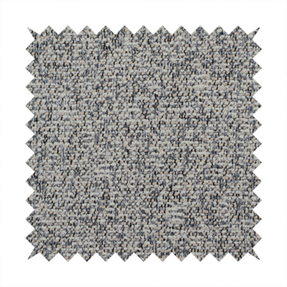 A multi-tonal light grey and cream textured woven fabric swatch.