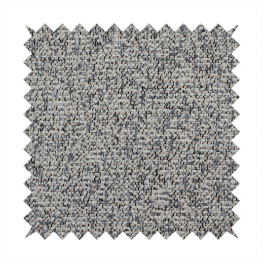 A multi-tonal light grey and cream textured woven fabric swatch.