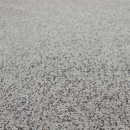 A multi-tonal light grey and cream textured woven fabric swatch.