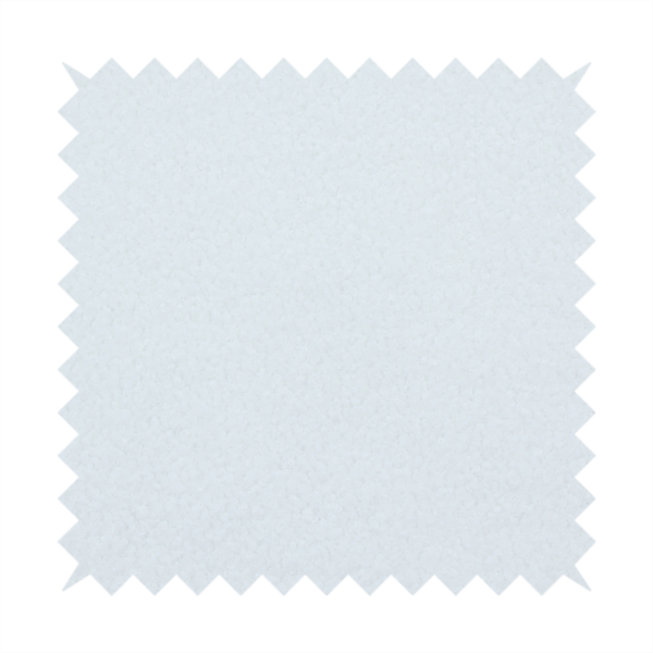 A textured white fabric with a soft, pebbled fleece or Sherpa appearance.