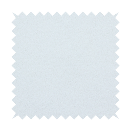 A textured white fabric with a soft, pebbled fleece or Sherpa appearance.