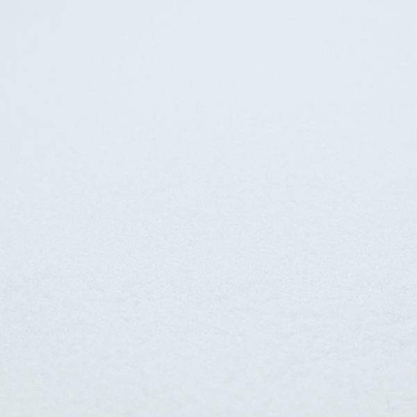 A textured white fabric with a soft, pebbled fleece or Sherpa appearance.