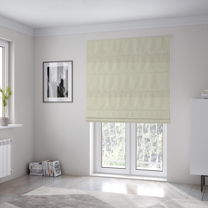 The fabric used to create these Roman blinds is a textured ivory or light cream bouclé upholstery fabric.