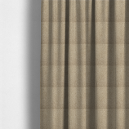 The fabric used to create these made-to-measure curtains is a textured khaki or warm taupe bouclé upholstery fabric.