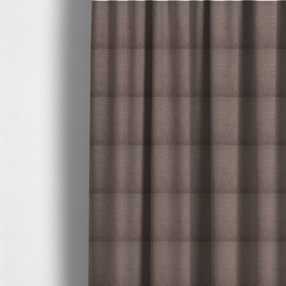 The fabric used to create these made-to-measure curtains is a textured rosy-brown or mauve bouclé upholstery fabric.