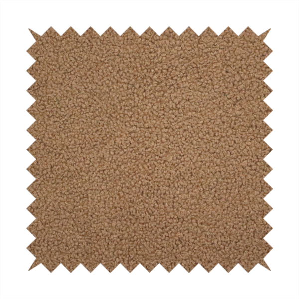 A textured medium brown or chestnut bouclé upholstery fabric.
