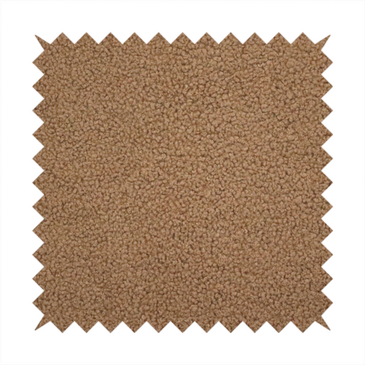A textured medium brown or chestnut bouclé upholstery fabric.