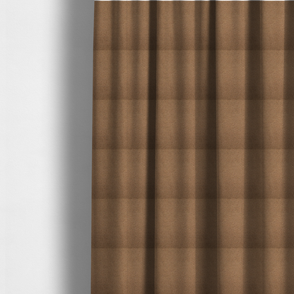 The fabric used to create these made-to-measure curtains is a textured medium brown or chestnut bouclé upholstery fabric.