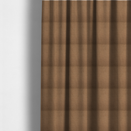 The fabric used to create these made-to-measure curtains is a textured medium brown or chestnut bouclé upholstery fabric.