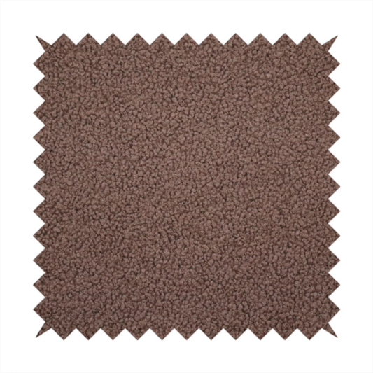 A textured chocolate brown bouclé upholstery fabric.