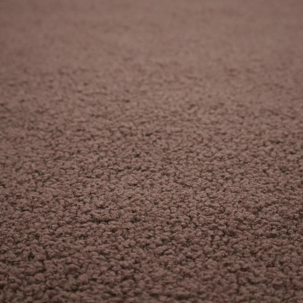 A textured chocolate brown bouclé upholstery fabric.