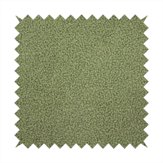 A dense, tightly looped, and pebbled surface characteristic of heavy wool or fleece, with subtle variations in light and shadow highlighting its nappy, tactile pile.