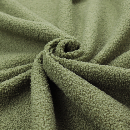 A dense, tightly looped, and pebbled surface characteristic of heavy wool or fleece, with subtle variations in light and shadow highlighting its nappy, tactile pile.