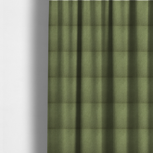 The fabric used to create these made-to-measure curtains is a dense, tightly looped, and pebbled surface characteristic of heavy wool or fleece, with subtle variations in light and shadow highlighting its nappy, tactile pile.