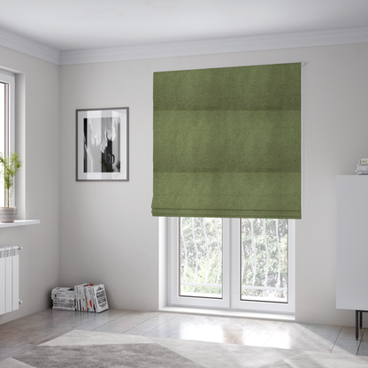 The fabric used to create these Roman blinds is a dense, tightly looped, and pebbled surface characteristic of heavy wool or fleece, with subtle variations in light and shadow highlighting its nappy, tactile pile.