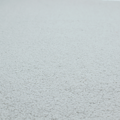 A light grey or pale ice-blue boucle fabric texture.