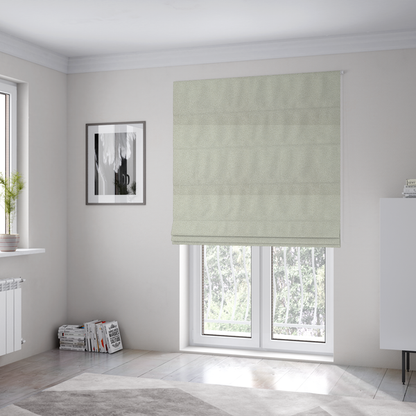 the fabric used to create these Roman blinds is a cream or off-white boucle fabric texture.