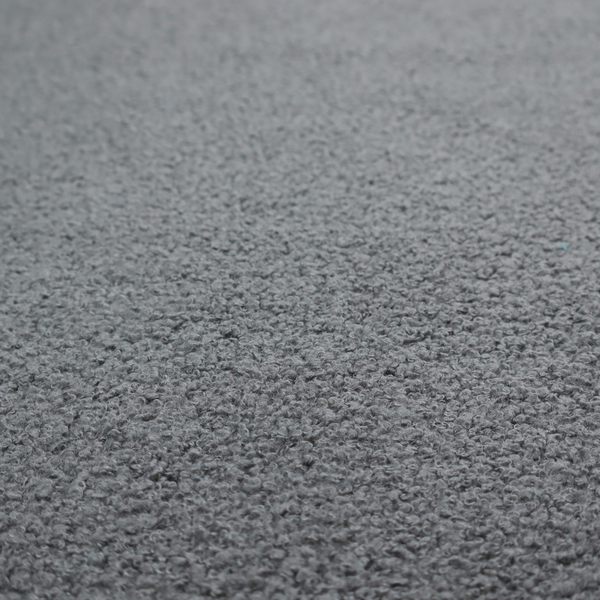 a charcoal or slate grey boucle fabric texture.