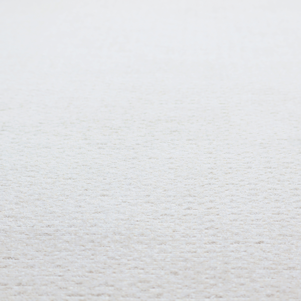 An off-white, finely textured woven upholstery fabric.