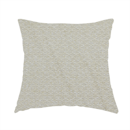The fabric used to create this handmade cushion is a cream-coloured, textured upholstery fabric.