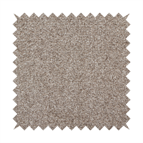 A swatch of taupe, heavily textured upholstery fabric.