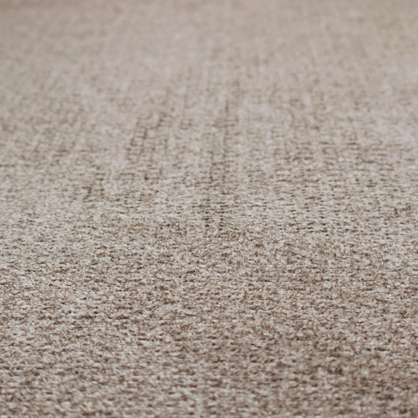 A swatch of taupe, heavily textured upholstery fabric.