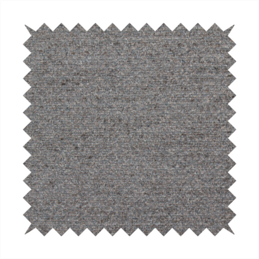 A dark grey, textured upholstery fabric.