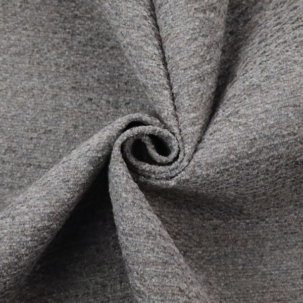 A dark grey, textured upholstery fabric.
