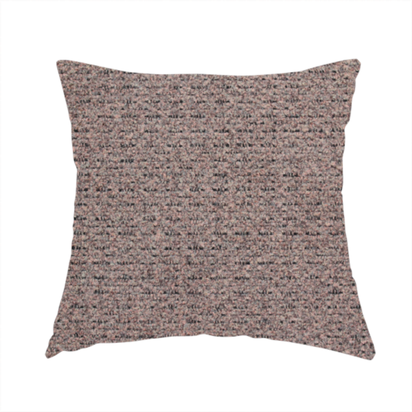 The fabric used to create this handmade cushion is a purple textured upholstery fabric.