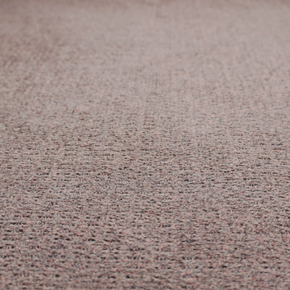 A purple textured upholstery fabric.