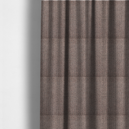 The fabric used to create these made-to-measure curtains is a purple textured upholstery fabric.