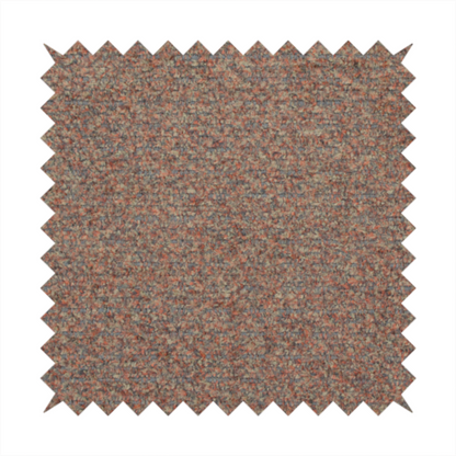 A multi-toned orange and grey textured upholstery fabric.
