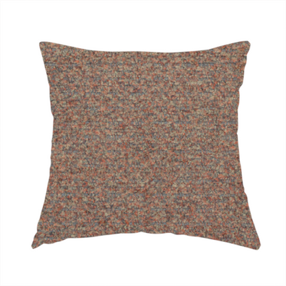 The fabric used to create this handmade cushion is a multi-toned orange and grey textured upholstery fabric.