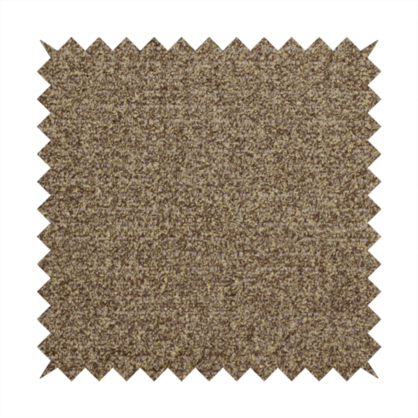 A multi-toned golden brown, textured upholstery fabric.
